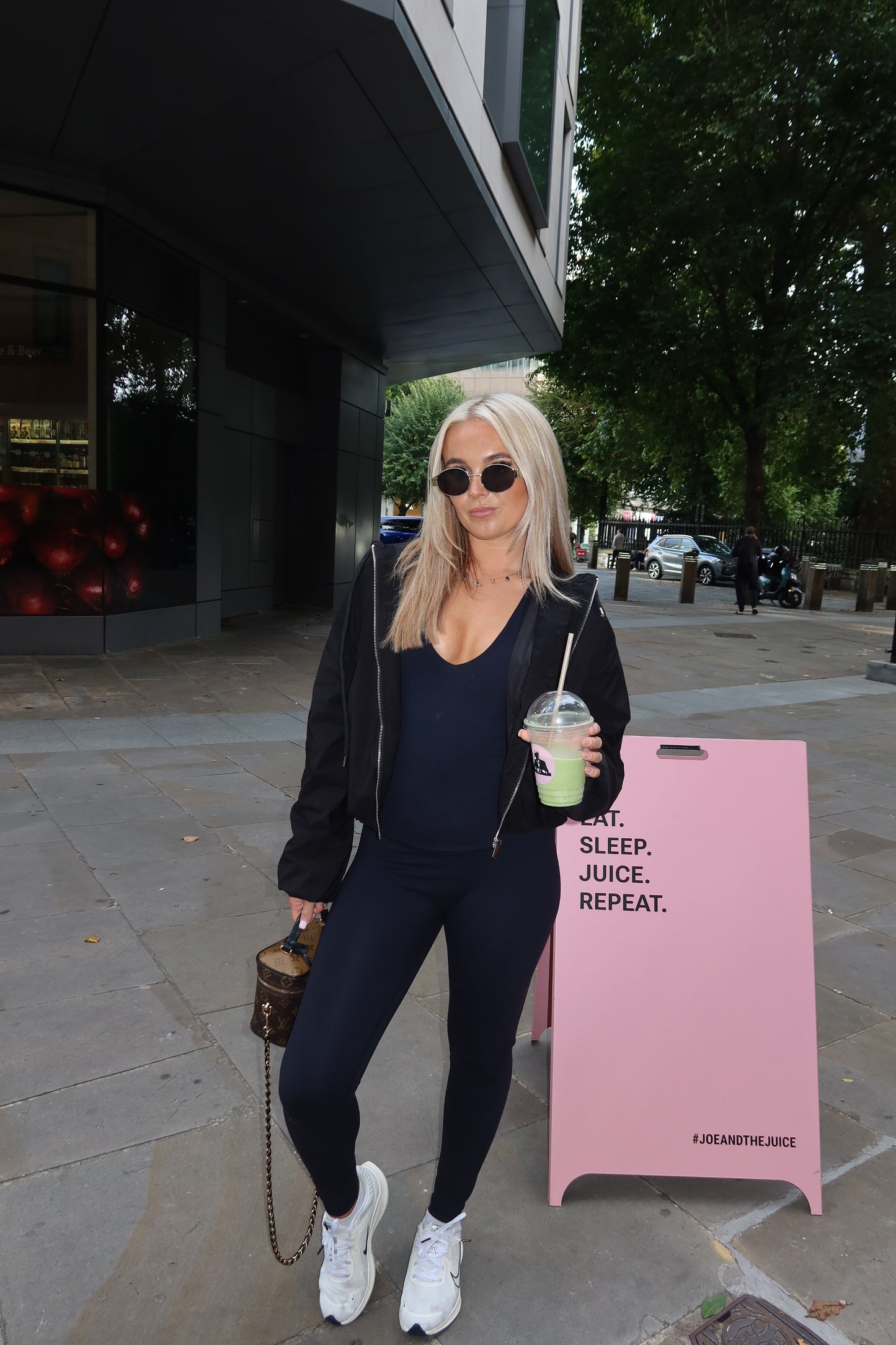 The black cropped zip up hooded jacket