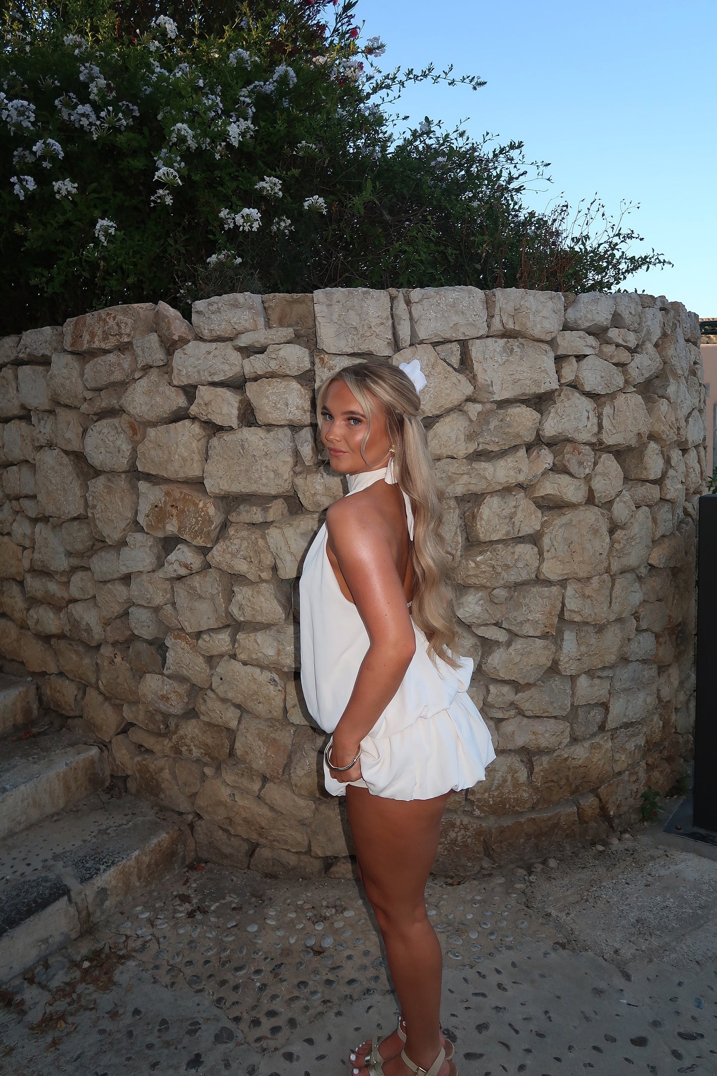 The ‘ANGEL’ white puffball playsuit beige