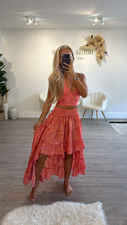 Halter neck tie up top and matching ruffle skirt coral