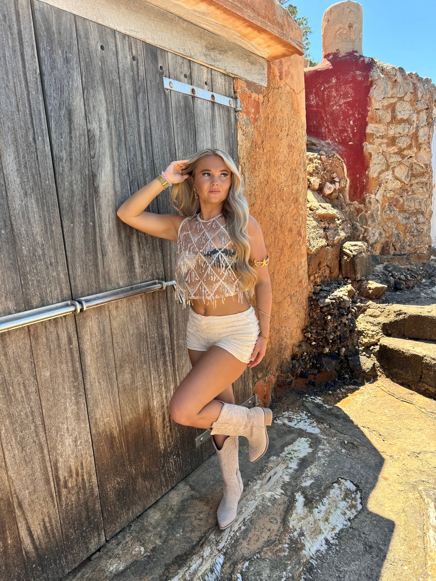 The ‘FESTI GIRL’ cream frill sparkle top