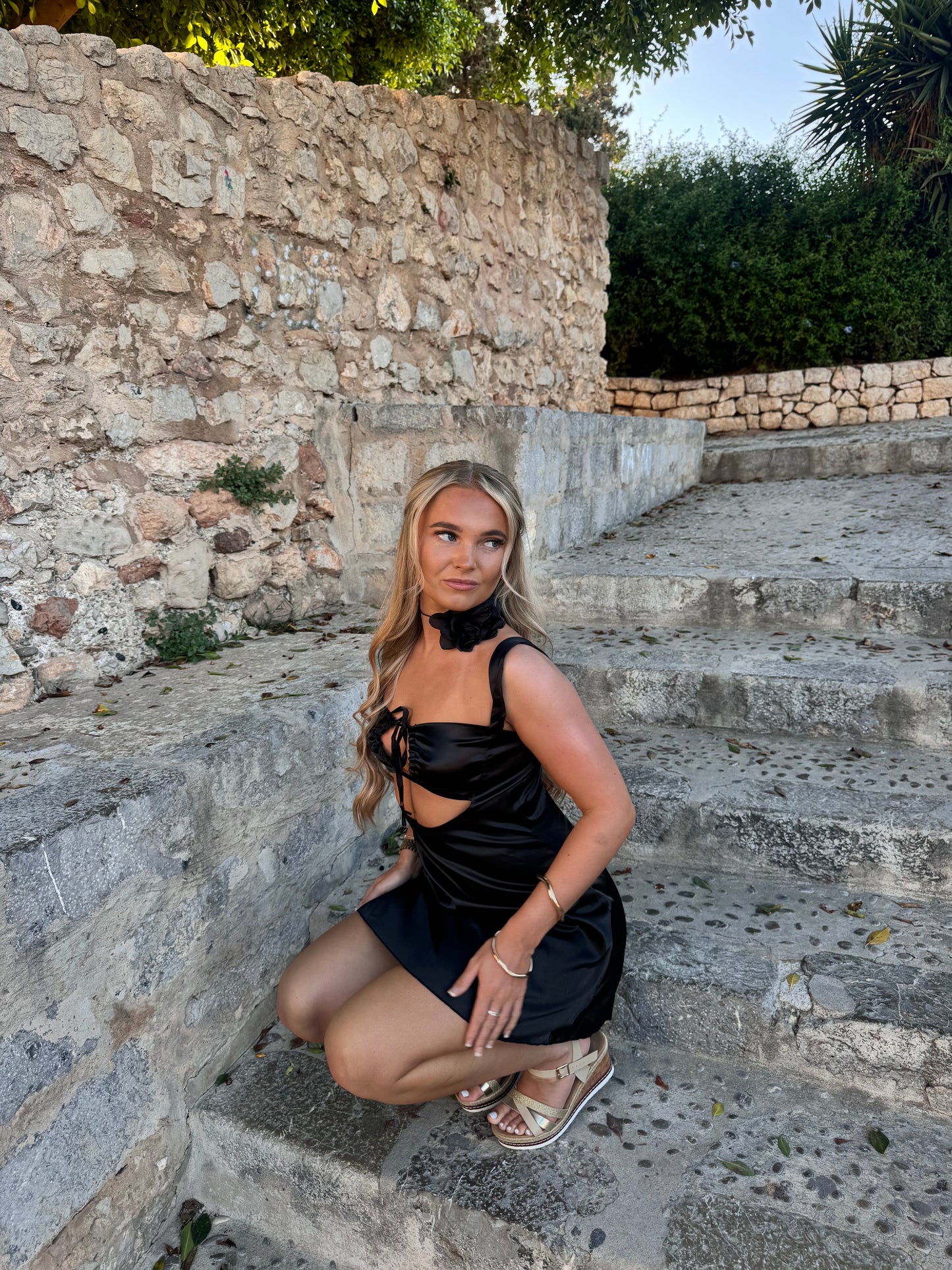 The ‘DAISY’ black satin mini dress