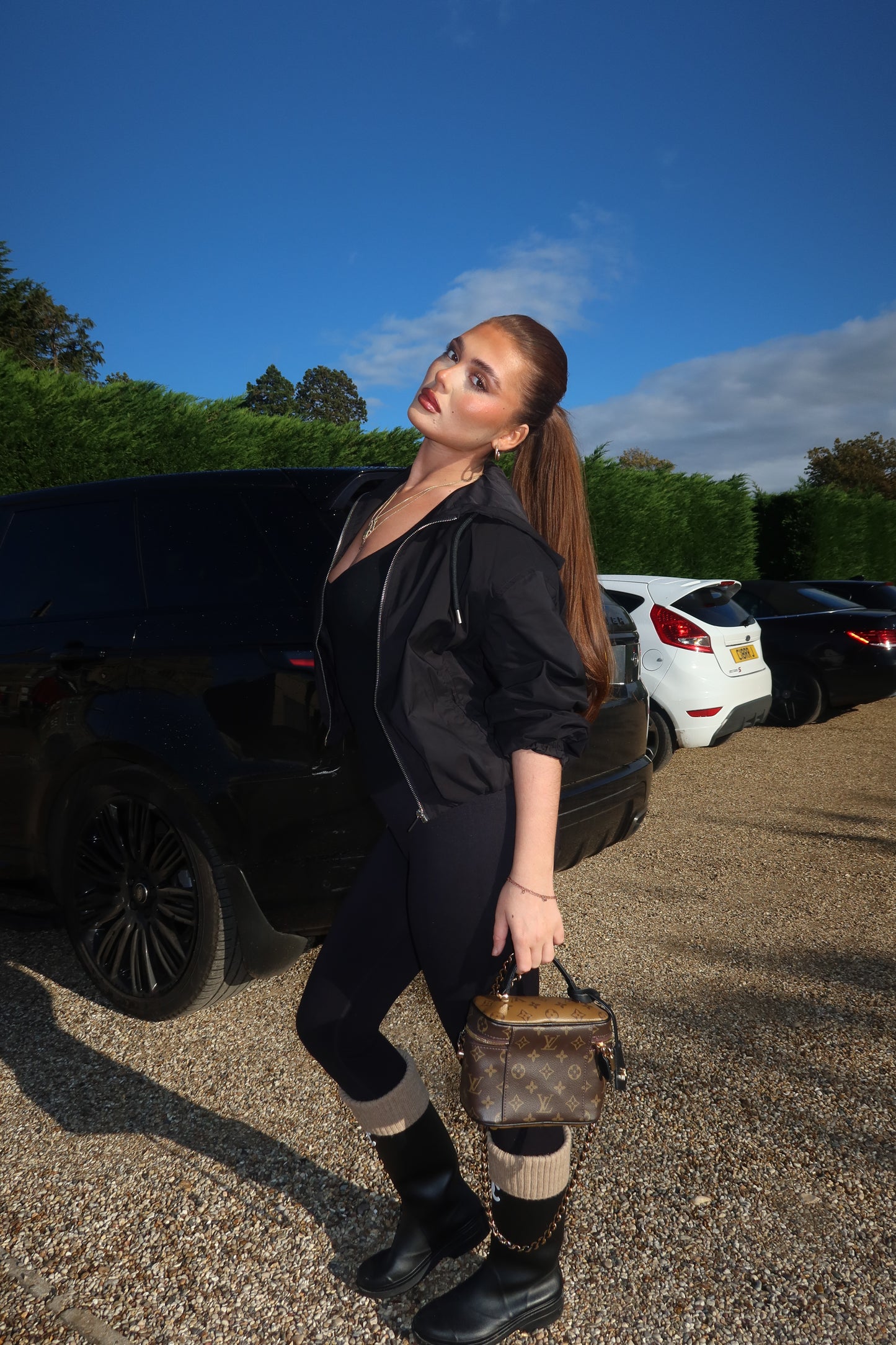 The black cropped zip up hooded jacket