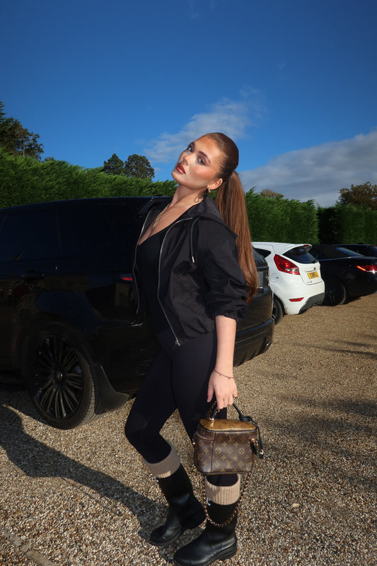 The black cropped zip up hooded jacket