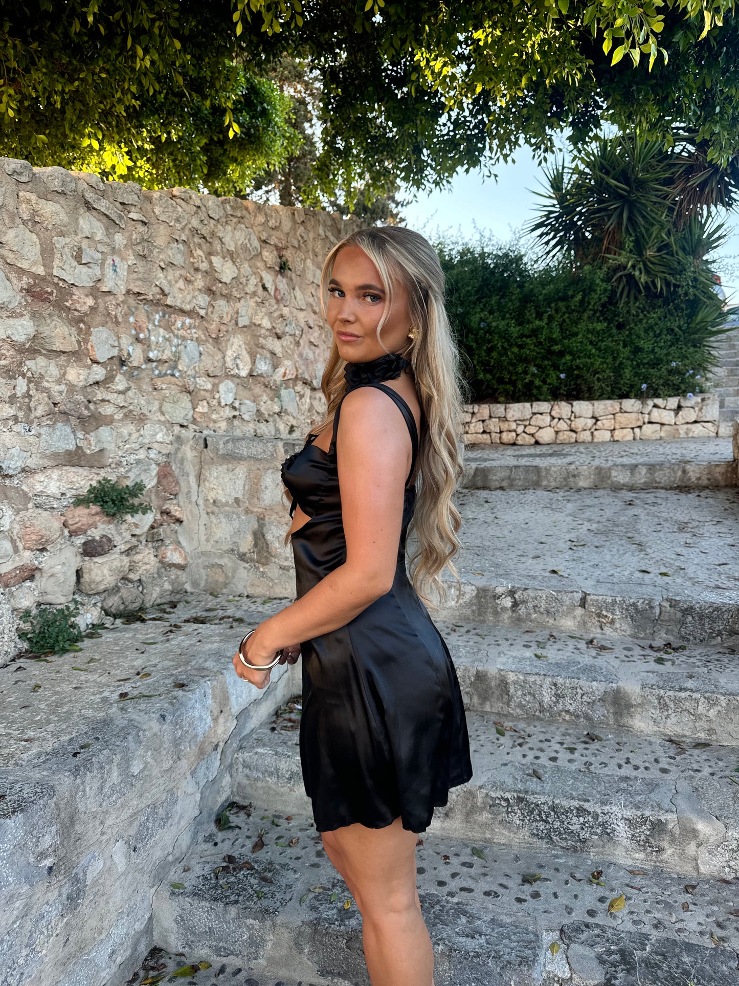 The ‘DAISY’ black satin mini dress