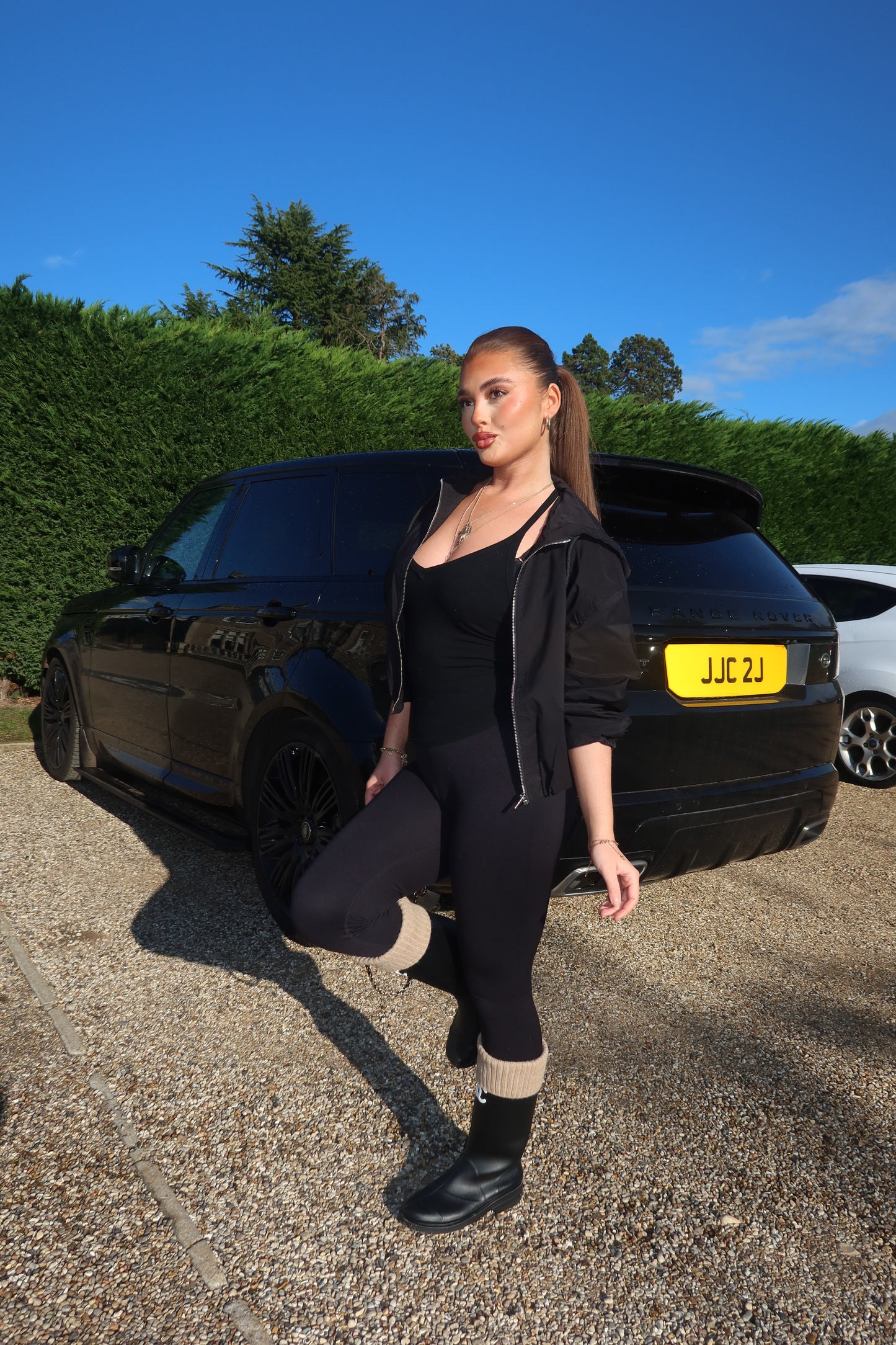 The black cropped zip up hooded jacket